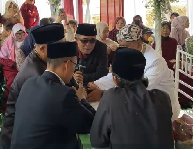 
Paoji Nurjaman Hadiri Pernikahan Ketua PAC Jampang Kulon, Dipercaya Menjadi Saksi Akad Nikah